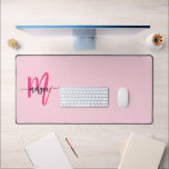 Hot Pink Modern Script Girly Monogram Name Desk Mat<br><div class="desc">Enhance your workspace with our Hot Pink Modern Script Girly Monogram Name Desk Mat! Featuring a bold hot pink design, this desk mat is personalised with your name in a chic modern script for a custom touch. Made from high-quality, durable materials, it provides a smooth, comfortable surface for writing and...</div>