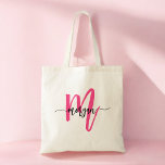 Hot Pink Modern Script Girly Monogram Name Tote Bag<br><div class="desc">Carry your essentials in style with our Hot Pink Modern Script Girly Monogram Name Tote Bag! Featuring a bold hot pink design, this tote is personalised with your name in a chic modern script for a trendy, custom look. Perfect for shopping, school, or everyday use, it offers ample space and...</div>