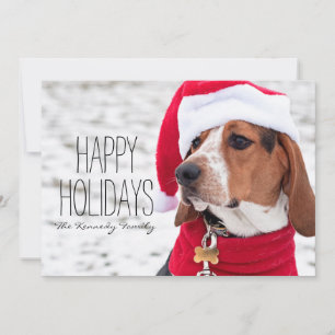 Hound dog wearing a winter coat and a Christmas Holiday Card