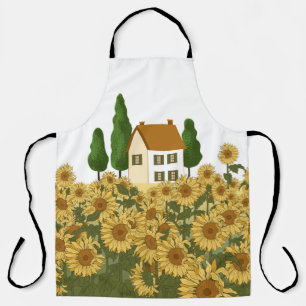 House, tall trees and a field of sunflowers in the apron
