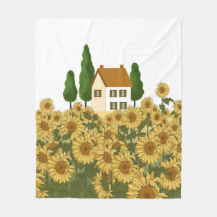 House, tall trees and a field of sunflowers in the fleece blanket