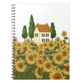 House, tall trees and a field of sunflowers in the notebook