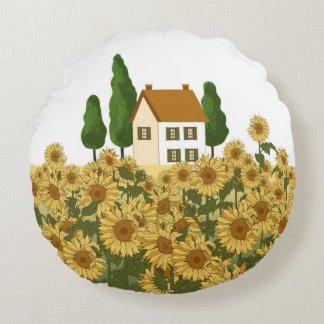House, tall trees and a field of sunflowers in the round cushion