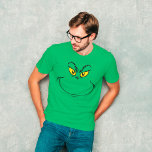 How Grinch Stole Christmas Face T-Shirt<br><div class="desc">The holidays will not be complete without Grinch!  HOW Grinch STOLE CHRISTMAS is a classic story of a town called Who-ville and how the Christmas spirit can melt even the coldest of hearts.</div>