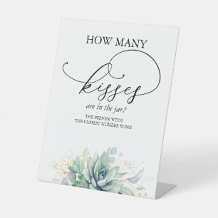 How many kisses are in the jar? pedestal sign