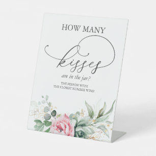 How many kisses are in the jar? pedestal sign