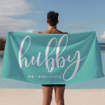 Hubby Teal And White Newlywed Groom Beach Towel<br><div class="desc">Celebrate your newlywed status with this stylish "Hubby" beach towel in teal and white, perfect for honeymoons, beach outings, or poolside relaxation. Made for grooms and newlyweds, this towel can be personalised with a last name, making it a unique gift or personal accessory. Whether by the beach or pool, it’s...</div>