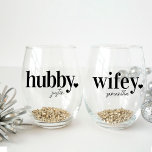 Hubby & Wifey | Personalised Name Newlyweds Stemless Wine Glass<br><div class="desc">Celebrate the couple with this cute text-based honeymoon design featuring "hubby" and "wifey" in black lettering with a small heart illustration. Personalise with each name beneath in handwritten-style script.</div>