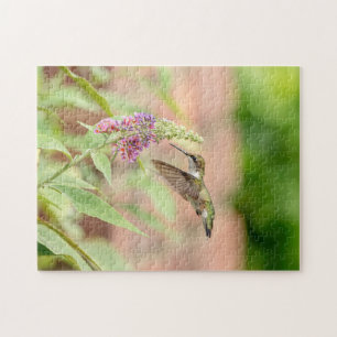 Hummingbird on a flowering plant jigsaw puzzle