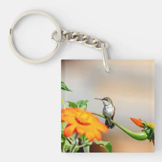 Hummingbird on a flowering plant key ring (Front)