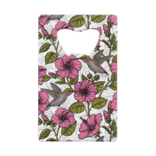 Hummingbirds and pink hibiscus flowers