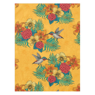 Hummingbirds and tropical bouquet in yellow tablecloth