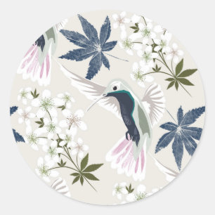 Hummingbirds and white flowers. classic round sticker
