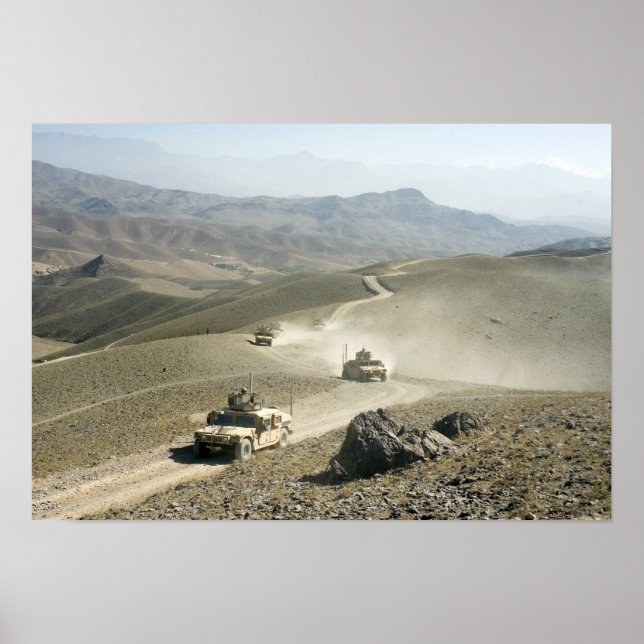 Humvees traverse rugged mountain roads poster (Front)