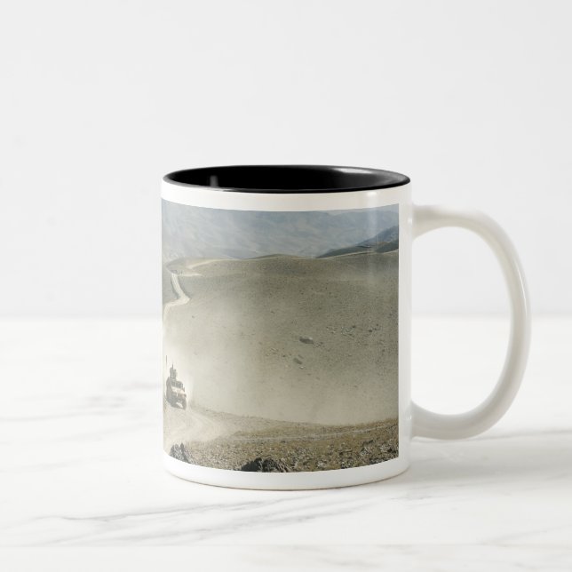 Humvees traverse rugged mountain roads Two-Tone coffee mug (Right)