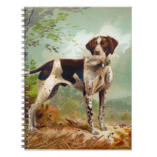 Hunter dog with bird in mouth notebook