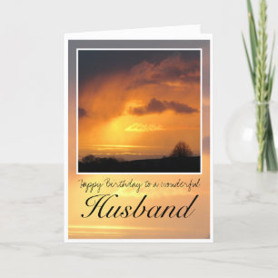 Husband Birthday, Bright Sun Behind Dark Clouds. Card
