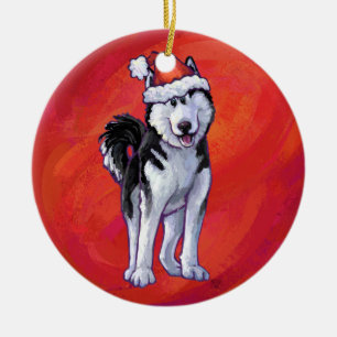Husky in Santa Hat On Red Ceramic Ornament