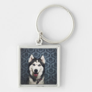 Husky Puppy Posing with a Dark Bakground Key Ring