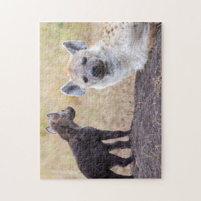 Hyena with young one jigsaw puzzle (Vertical)