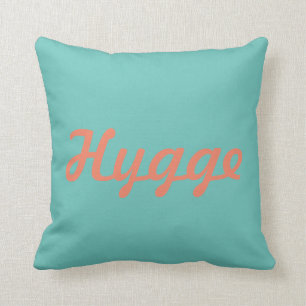 Hygge comfort in Danish language in cursive script Cushion