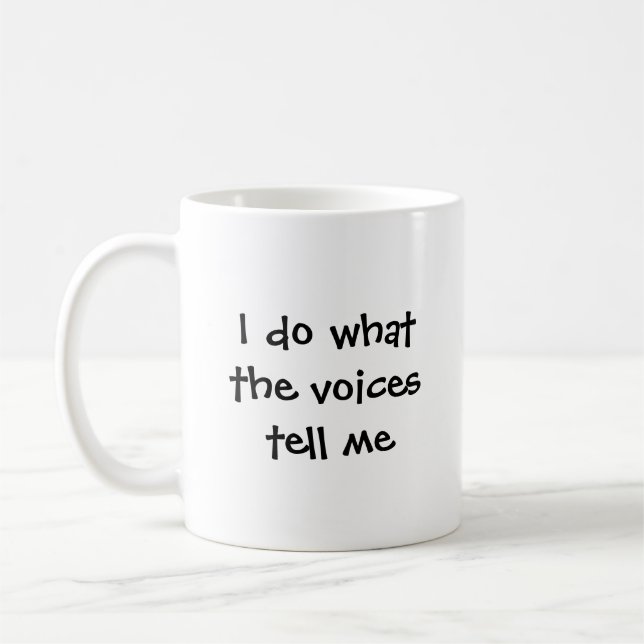 I do what the voices tell me coffee mug (Left)