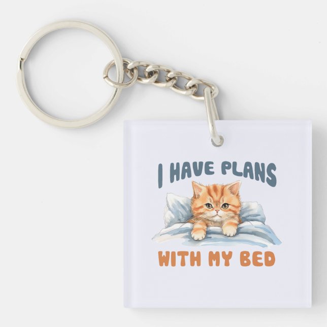 I Have Plans with My Bed – Cosy Orange Cat Key Ring (Front)