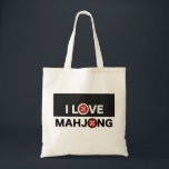 I Love Mahjong O Replaced with MJ Flower Tote Bag<br><div class="desc">Fun and great-looking tote bag for a Mahjong player. I love the combination of red, black and white --so crisp and fresh looking. Simple and unique Mahjong design for folks who love to play the game. Black, easy-to-read text reads I LOVE MAHJONG with each O replaced with a colourful red...</div>