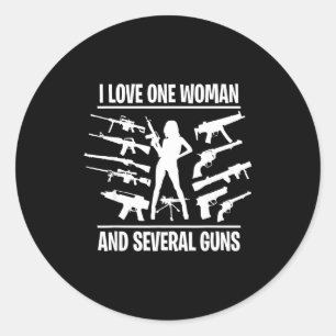 I love one woman and several guns classic round sticker