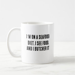 I’m on a seafood diet. I see food, and I butcher Coffee Mug