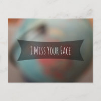 "I Miss Your Face" Over Photo of Blurred Globe
