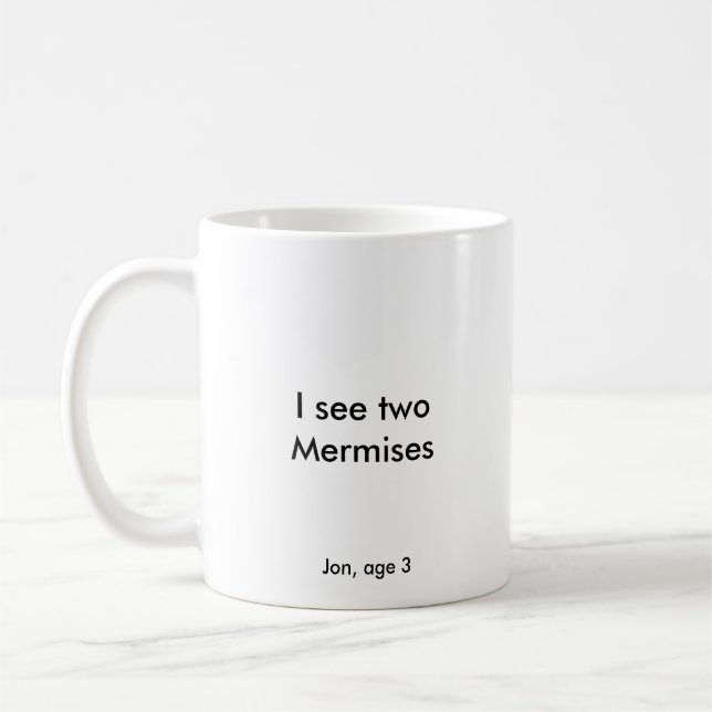 I see two mermises coffee mug (Left)