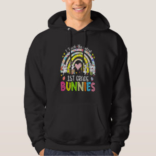 I Teach The Cutest 1st Grade Bunnies Teacher Easte Hoodie