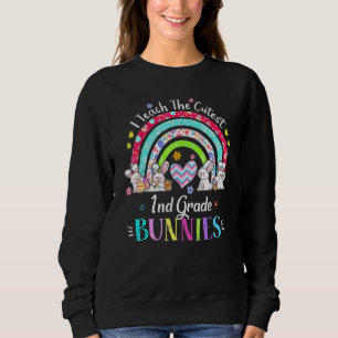 I Teach The Cutest 1st Grade Bunnies Teacher Easte Sweatshirt