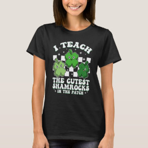 I Teach The Cutest Shamrocks Groovy Teacher St Pat T-Shirt