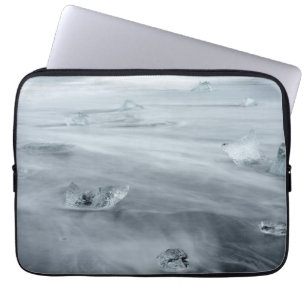 Ice and water on a beach, iceland laptop sleeve