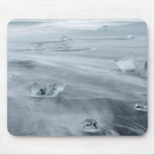 Ice and water on a beach, iceland mouse pad