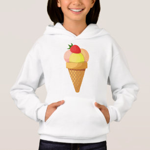 Ice cream scoops and strawberry in waffle cone