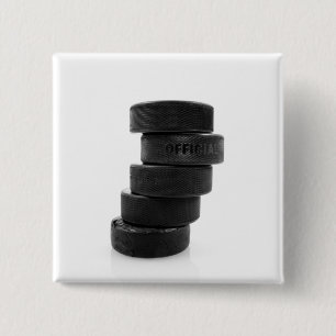 Ice hockey pucks... button