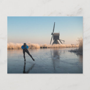 Ice skating past windmill and reeds postcard