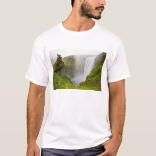 Iceland. Skogarfoss Waterfall plunges over a T-Shirt