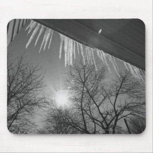 Icicles on roof and sun mouse pad