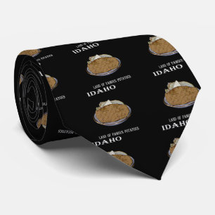 Idaho "Land of Famous Potatoes". Tie