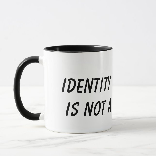 Identity Theft Is Not A Joke Mug (Left)