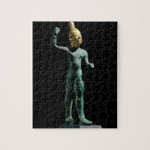 Idol of the storm god Baal, from Syria, Bronze Age Jigsaw Puzzle