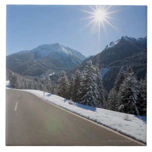 Idyllic empty road thrugh a winter landscape, 2 ceramic tile