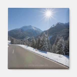 Idyllic empty road thrugh a winter landscape, 2 magnet