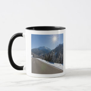 Idyllic empty road thrugh a winter landscape, 2 mug