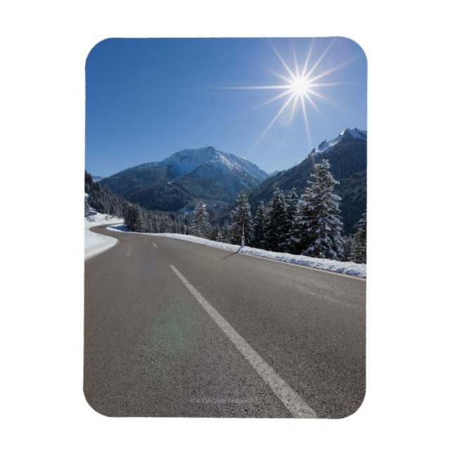 Idyllic empty road thrugh a winter landscape, magnet (Vertical)