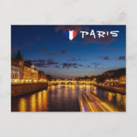 Illuminated Conciergerie at night - Paris, France